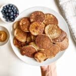 a pile of 3 ingredient banana oat pancakes for baby on a plate