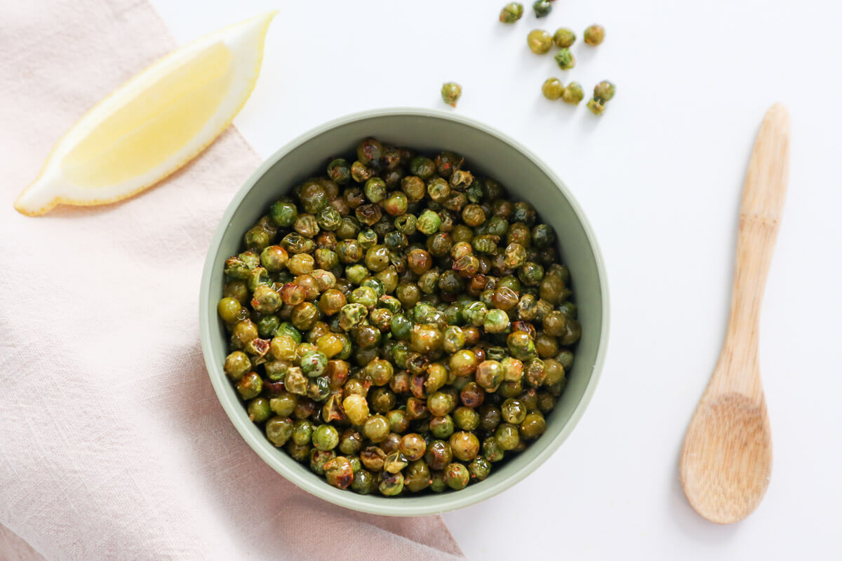 Salted garlic crunchy roasted peas in a bowl.