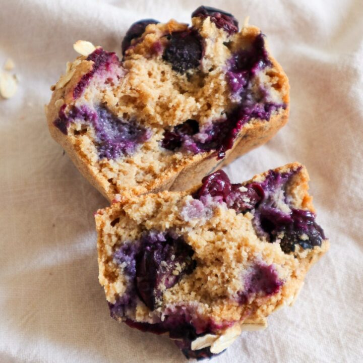 Halved vegan blueberry oatmeal muffin.