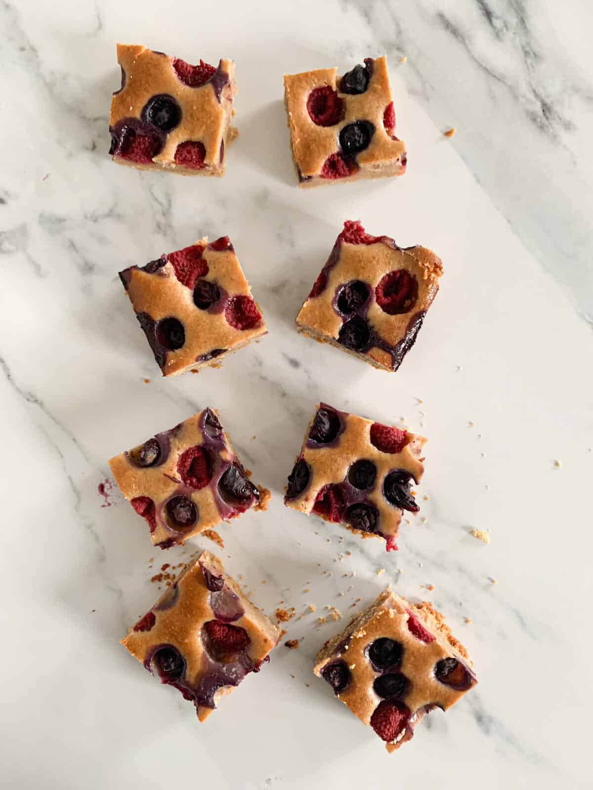 8 pieces of yoghurt cake cut up in equal squares