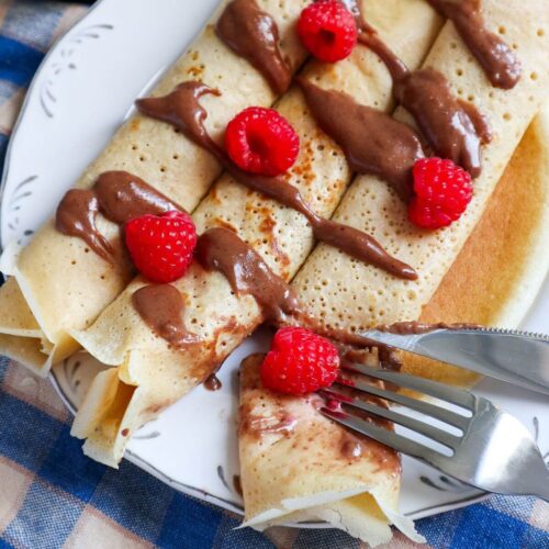 3 rolled dairy free crepes topped with homemade nutella.