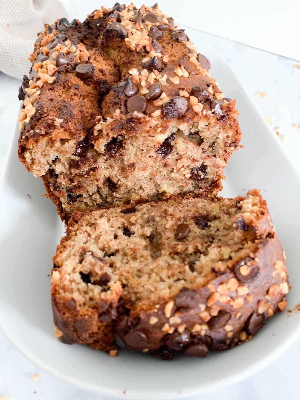 Cut-through shot of moist chocolate chip banana bread 