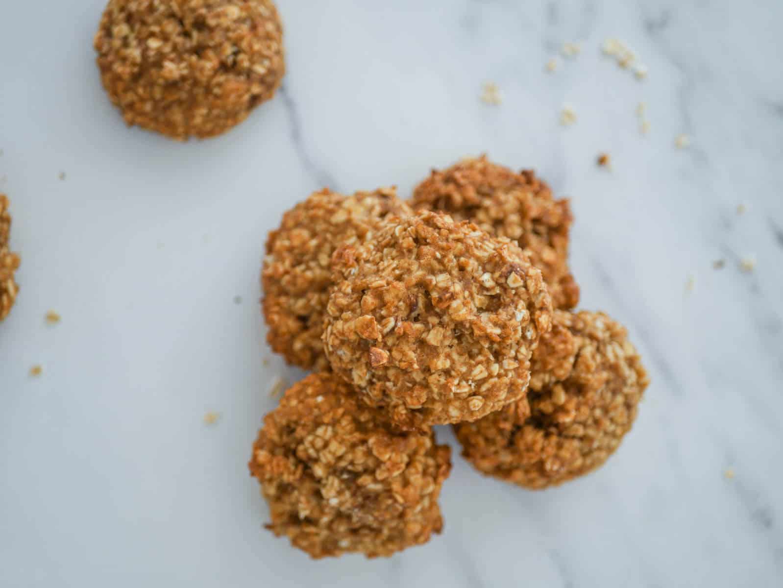 healthy applesauce oatmeal cookies piled together 