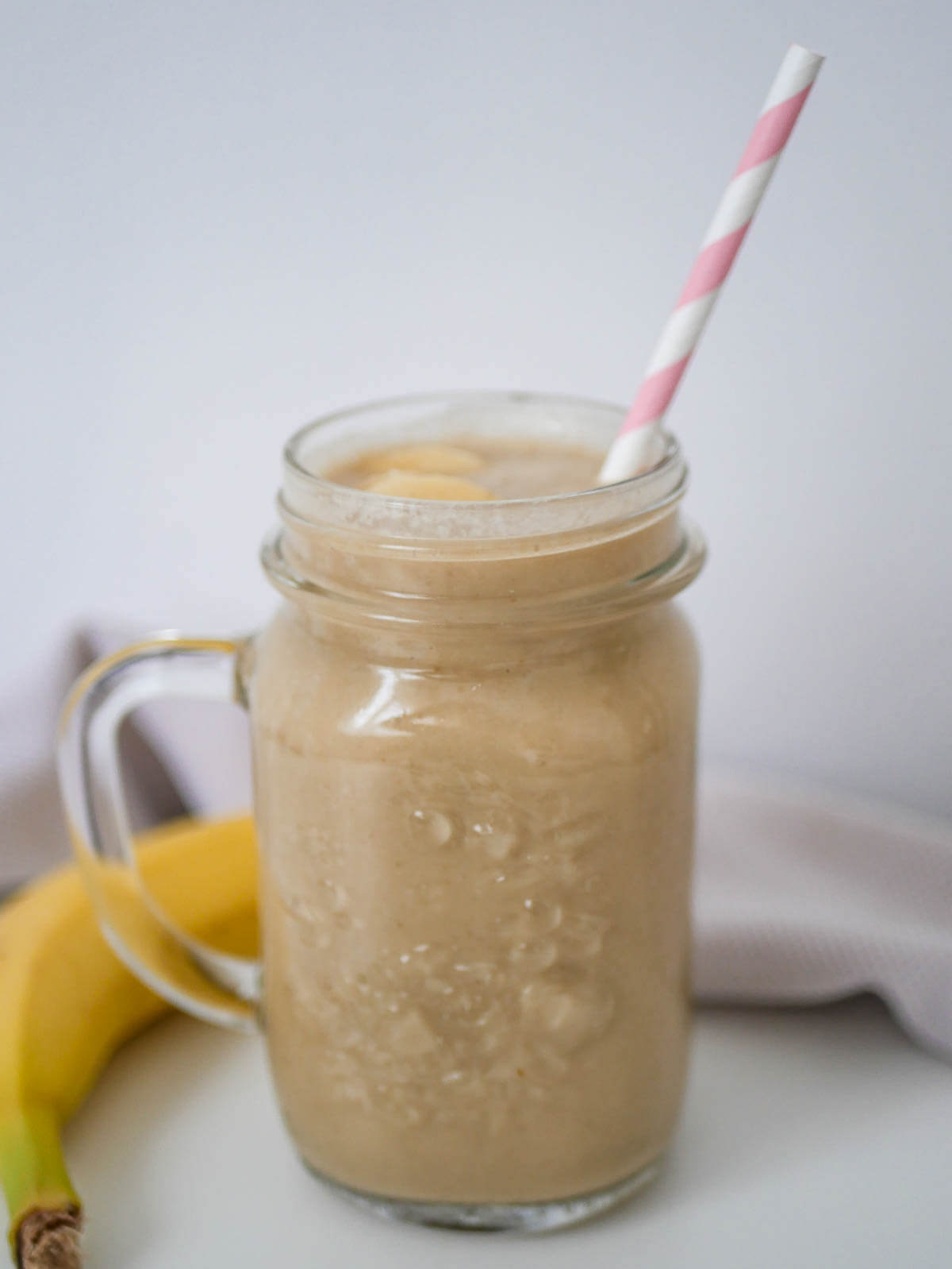 Apple Banana Smoothie with pink straw