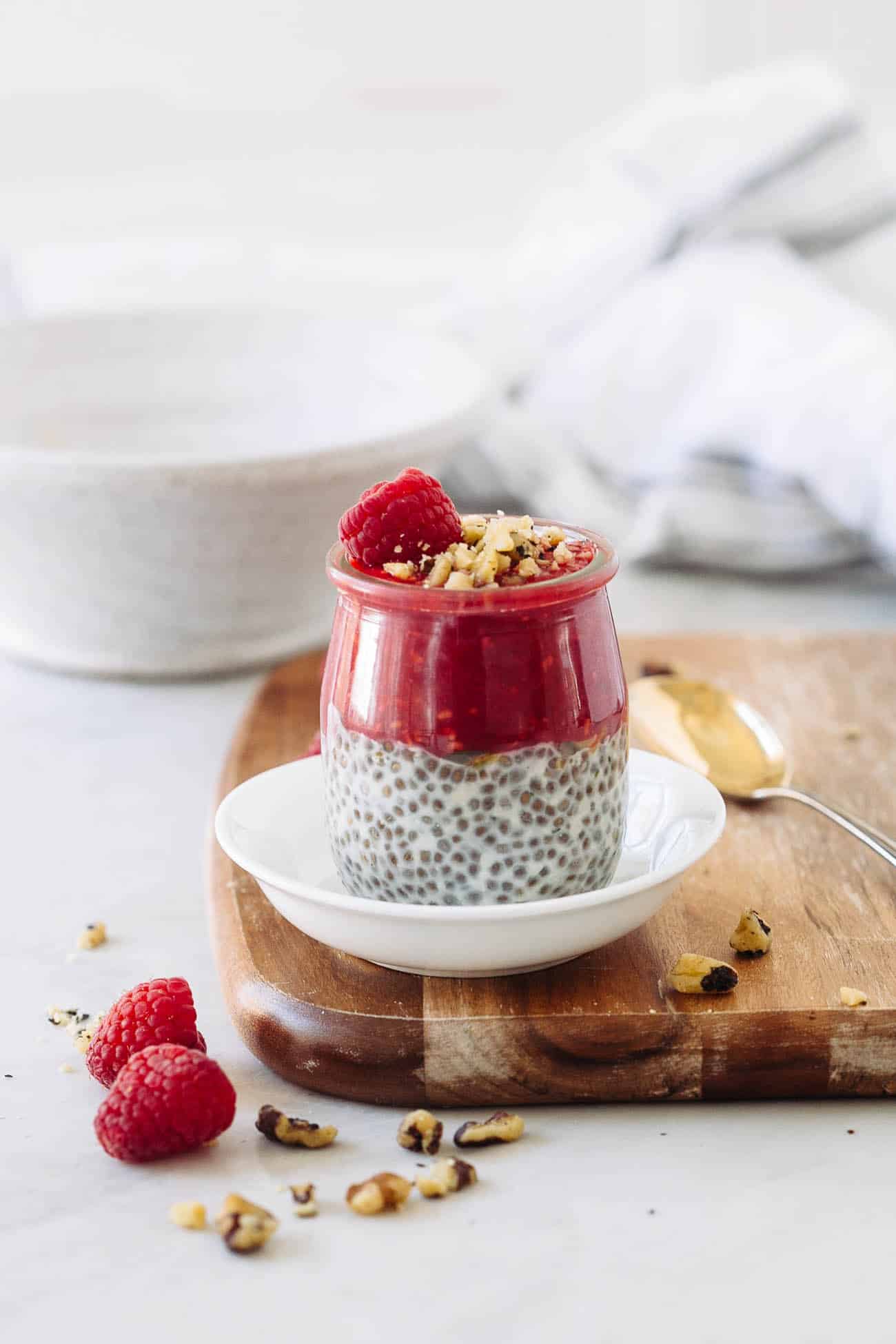 raspberry chia pudding in a glass jar 