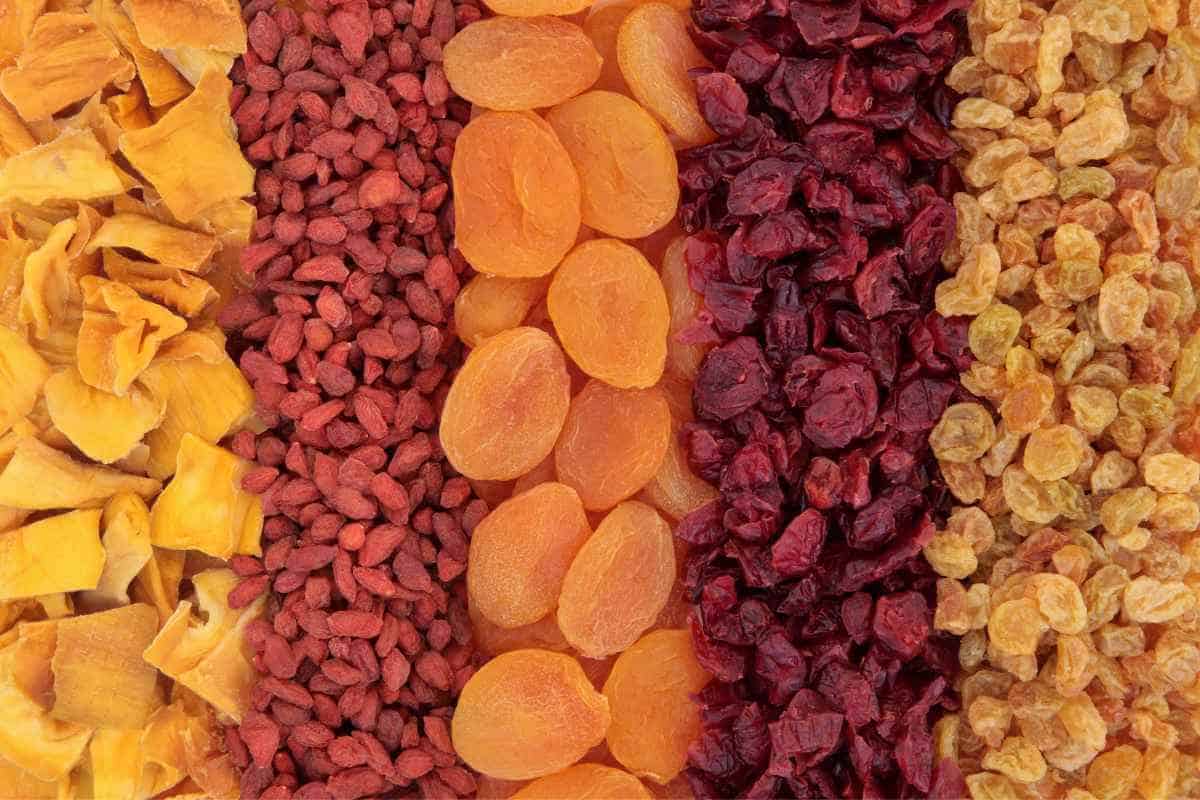 Different dried fruits arranged in lines