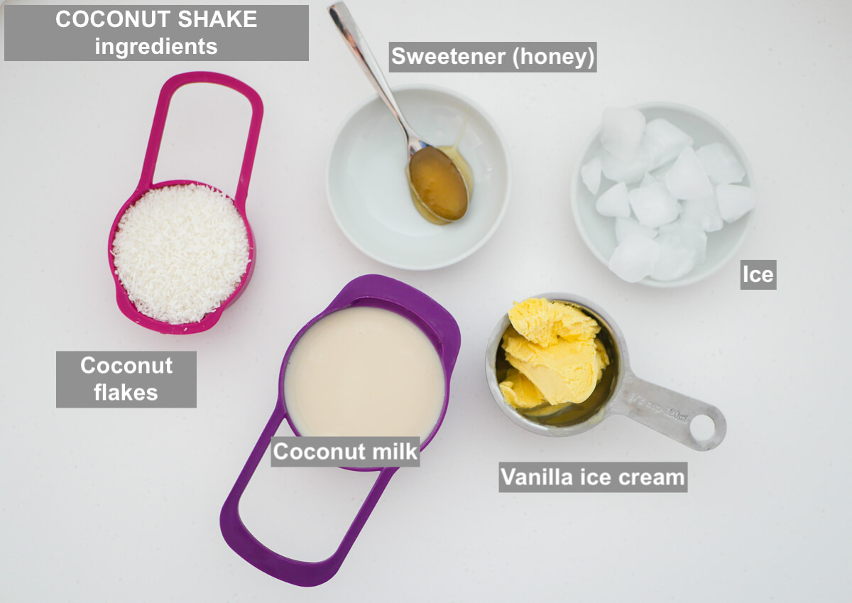 ingredients on white background - milk, coconut flakes, vanilla ice cream, honey and ice