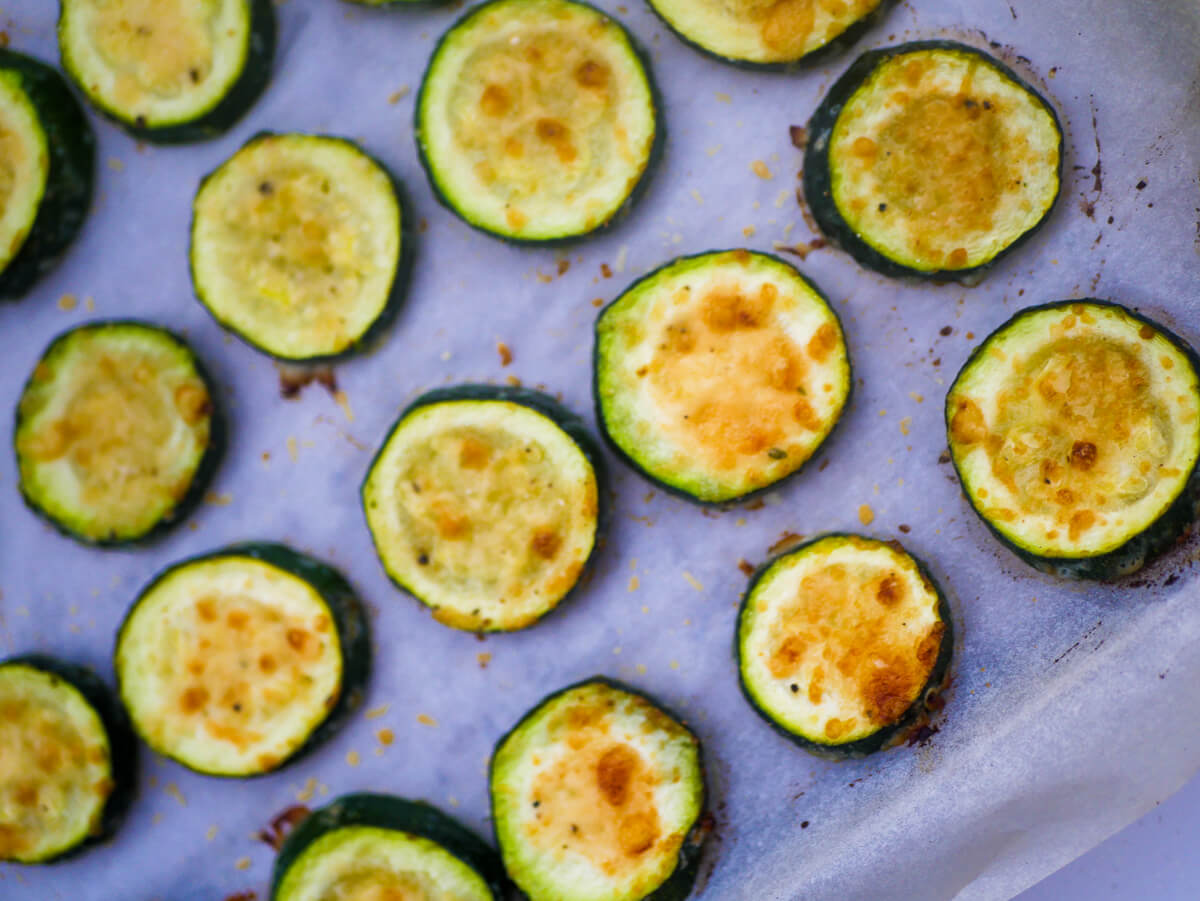 close up diagonal photo of roasted zucchini slices