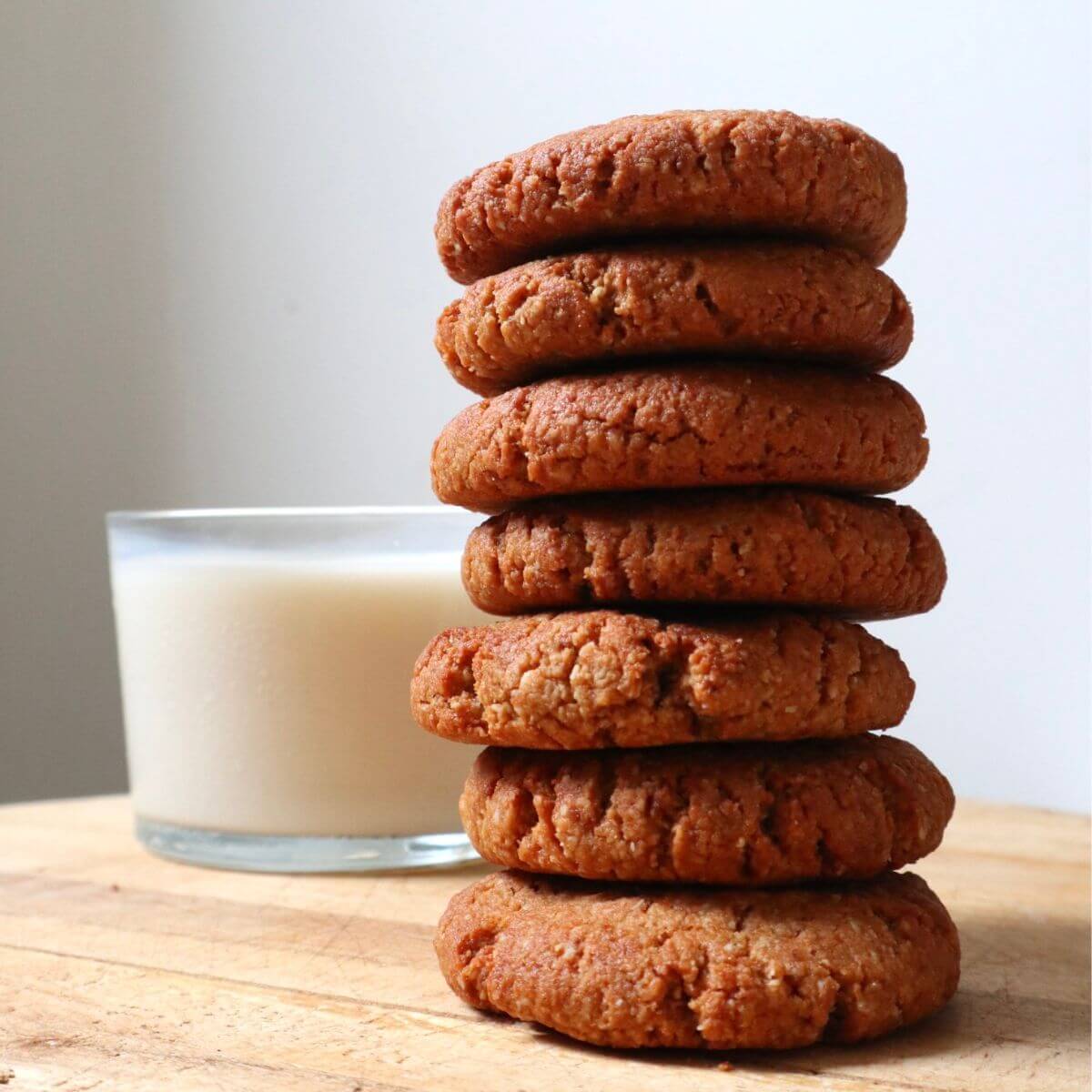 stacked cookies on wooden tray 