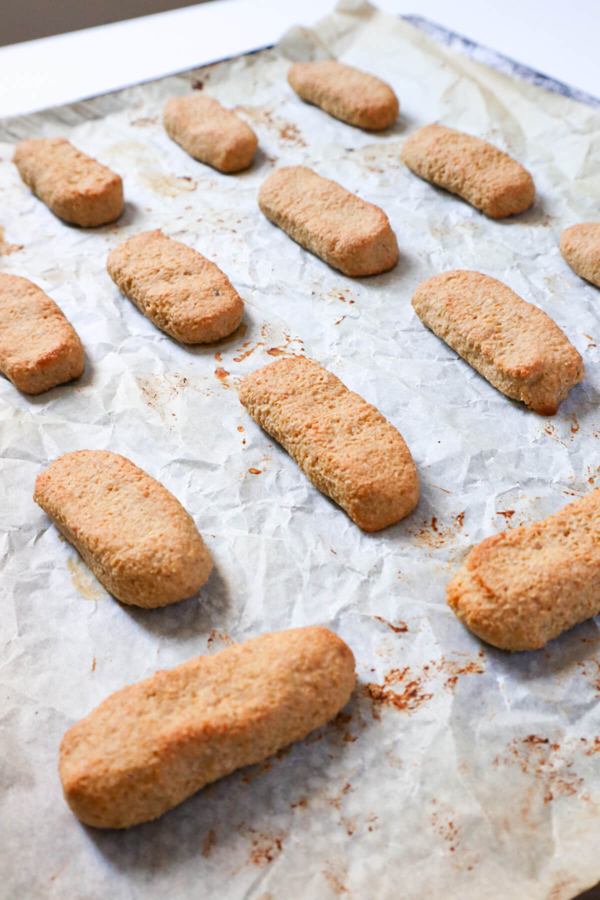 baked biscuits on parchment paper