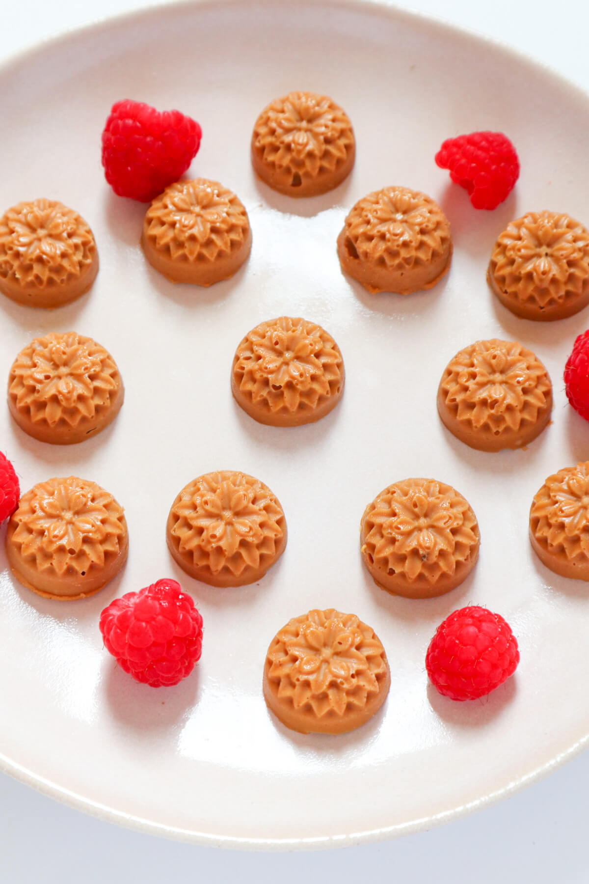 Fat bombs from a flower mold on a plate