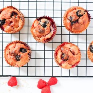 Berry muffins on a cookie sheet