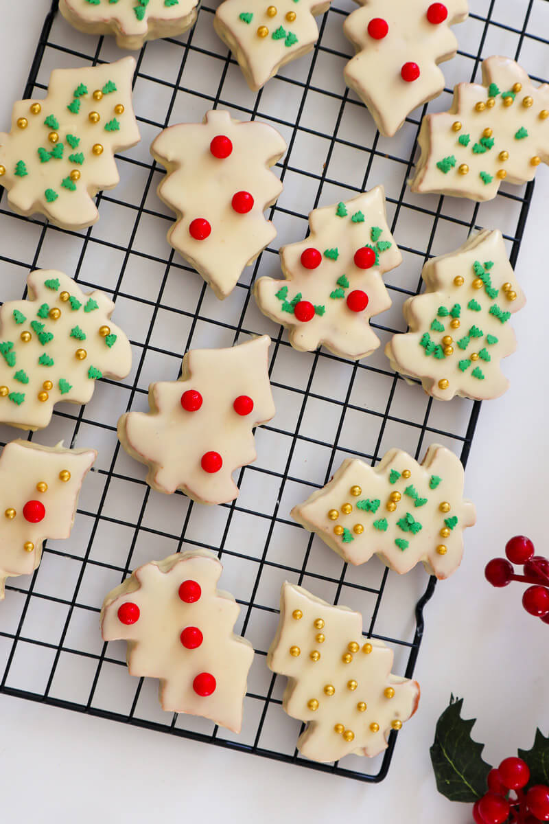 Homemade Little Debbie Christmas Tree Cakes on a cooling rack.
