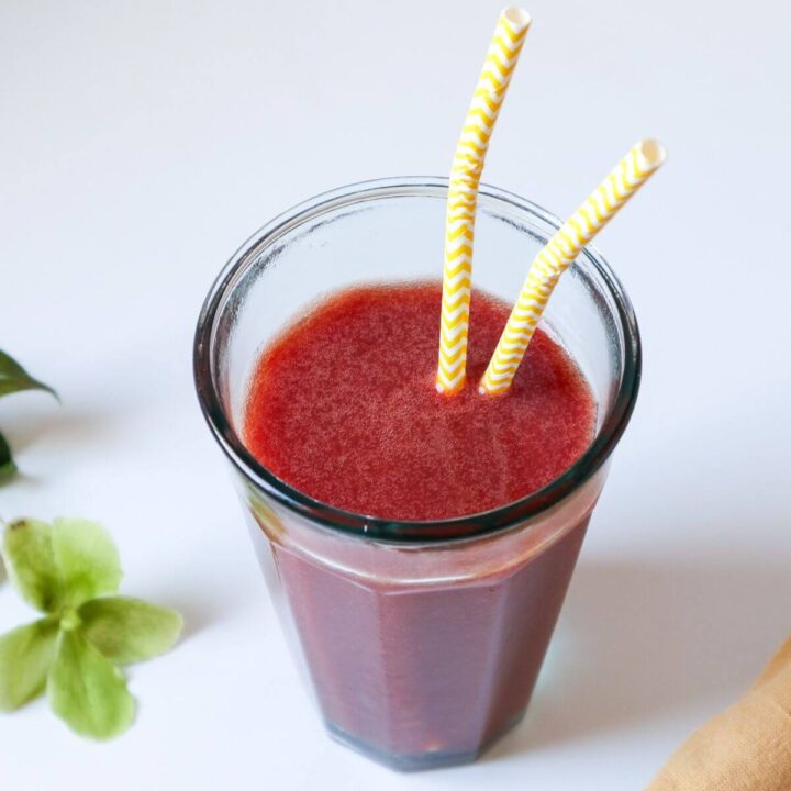 Top down view of homemade plum juice.