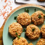 Lentil patties in a circle on a plate.