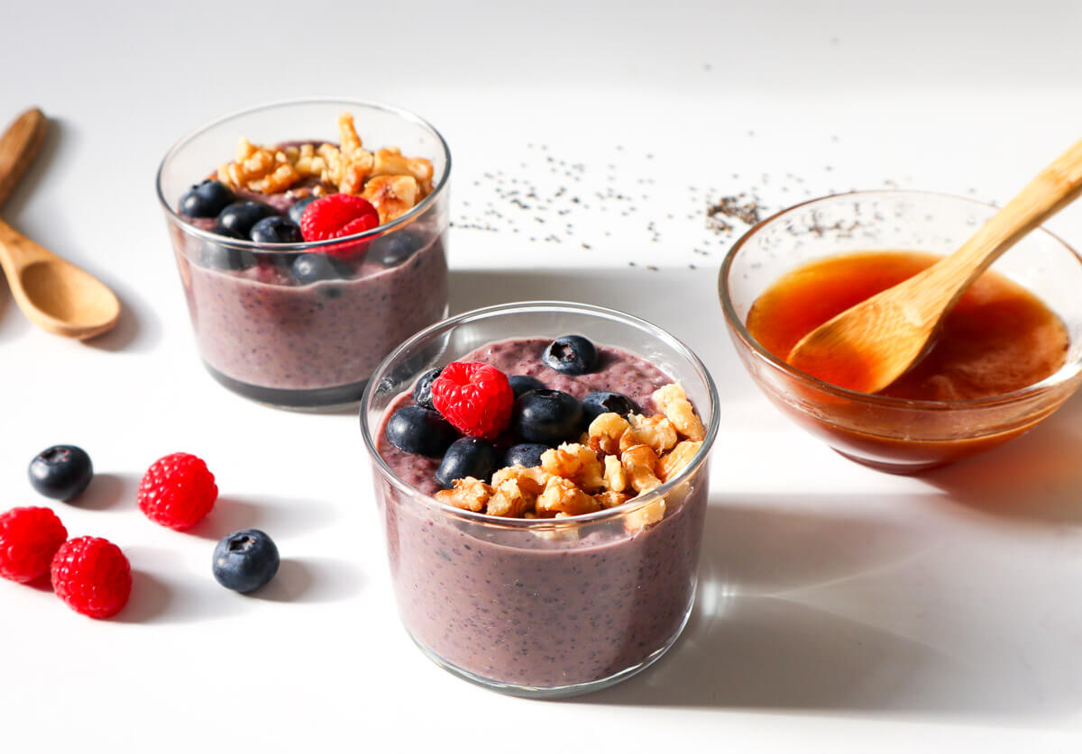 Blueberry Chia Pudding topped with berries and walnuts.