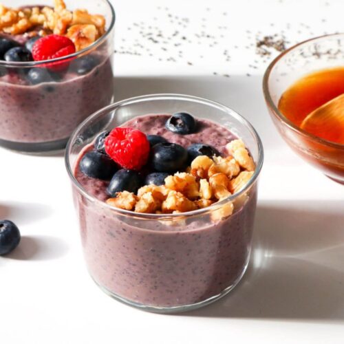 Blueberry Chia Pudding topped with berries and walnuts.