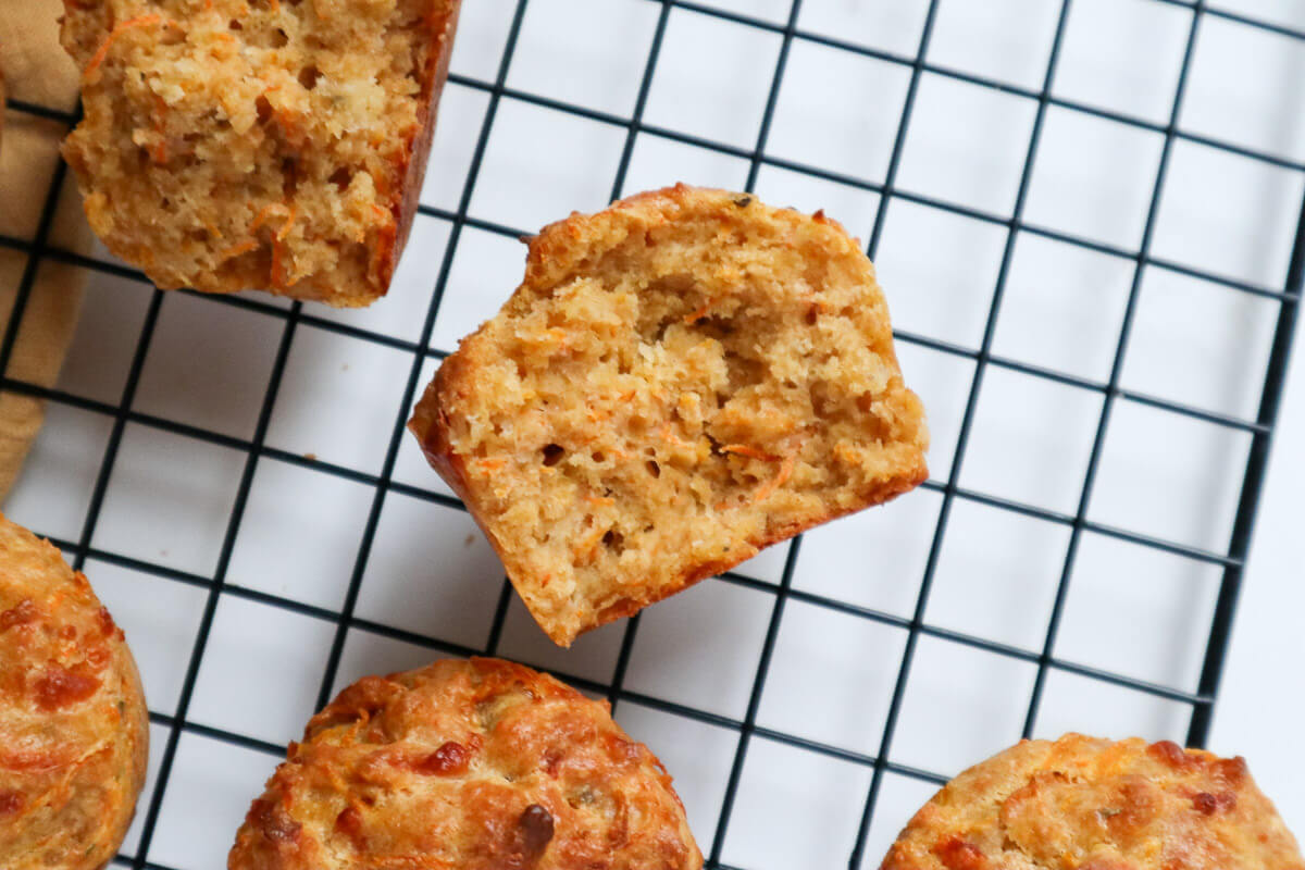 Halved pizza muffin on a cooling rack 