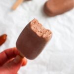 Bitten off chocolate popsicle.