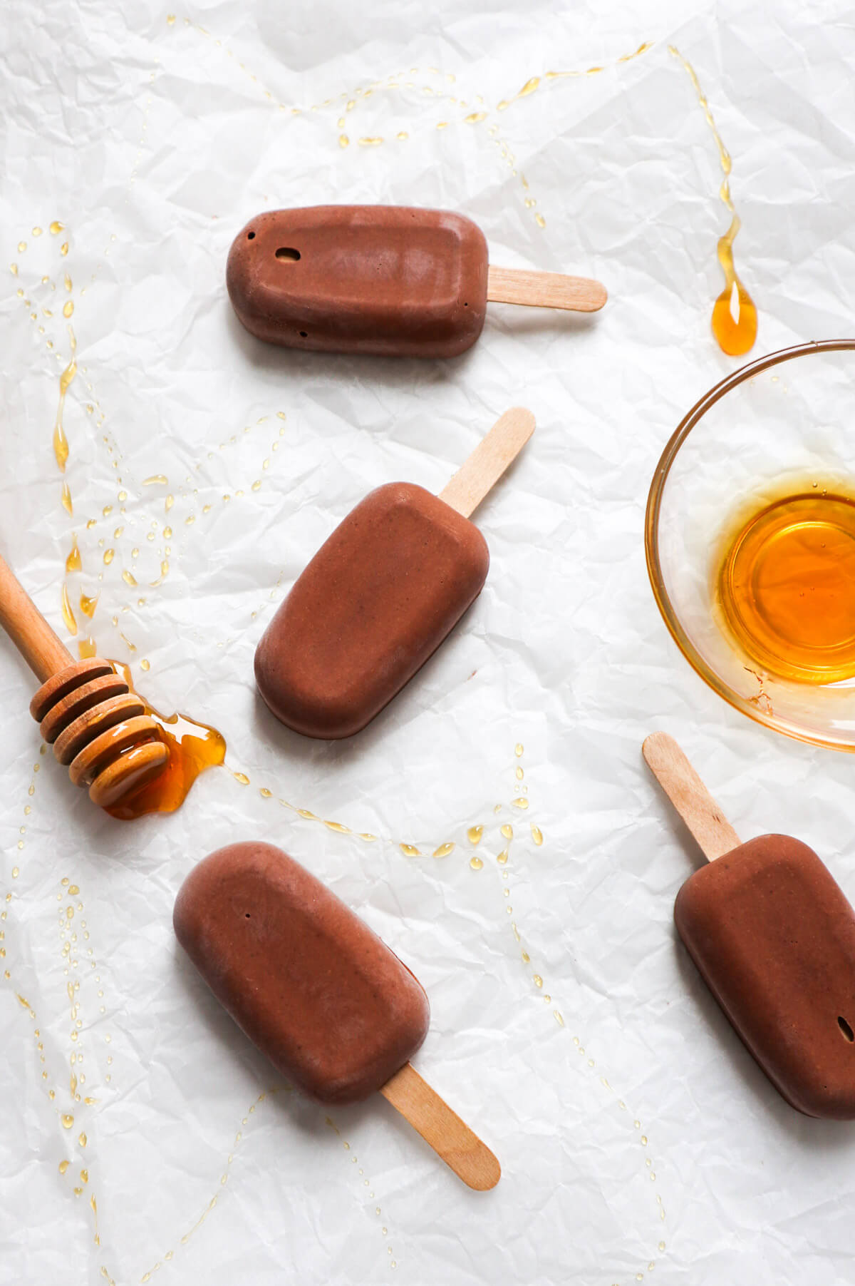 Vegan nutella popsicles on a white background